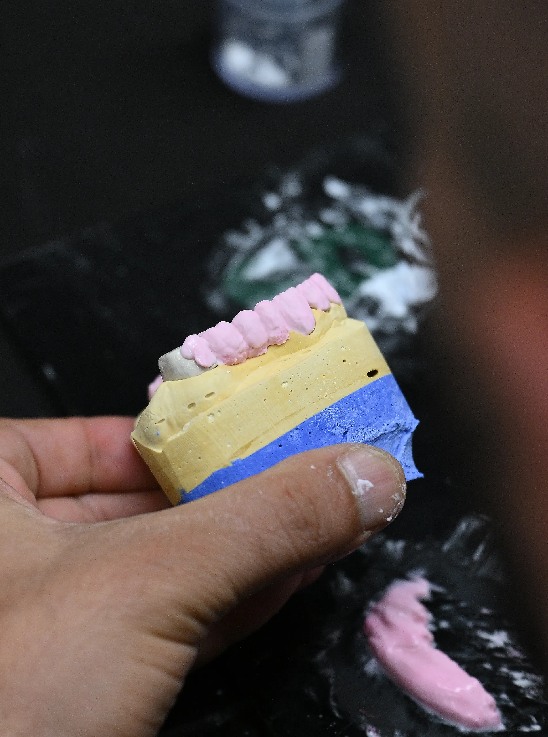 Dental technician working in AIC Dental in-house laboratory